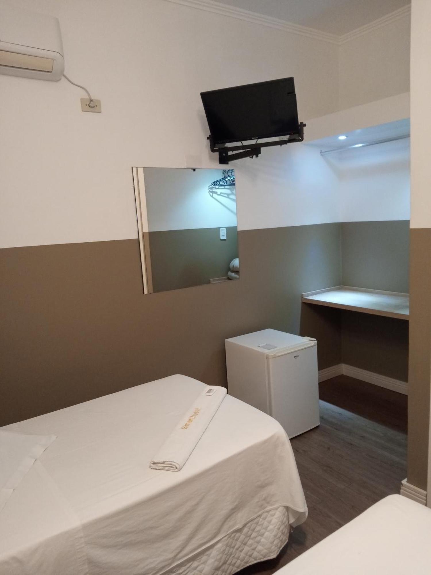 Smart Hotel Режістру Номер фото